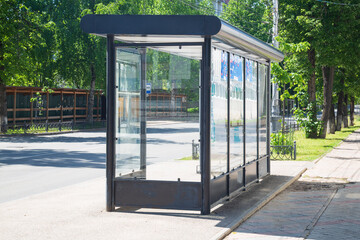 A modern bus stop.Glass bus stop.