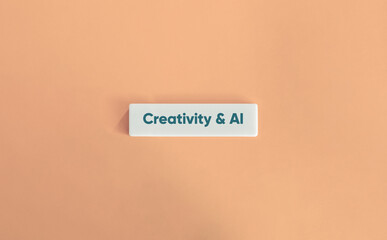 Creativity and Artificial Intelligence. Text on Block Letter Tile on Dusty Pink Background.
