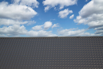 Metal tile.Roof for the house. Modern coatings for the roof of the house.