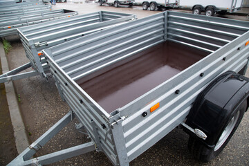 Fototapeta premium Open road trailer. Shop selling car trailers.