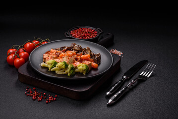 Colorful vegan vegetarian dish consists of tofu, broccoli, quinoa, mushrooms