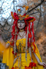 Obraz premium Deer girl in the autumn forest