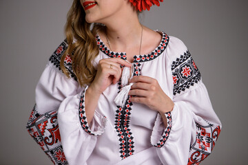 a woman in an embroidered dress