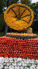 Pumpkin Crafts at fall harvest festival. Halloween farmers market. Concept of seasonal produce, country market and festive fall decorations.