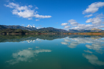 Fototapeta premium Beautiful lake with rocky mountains, forest and trees in background, Lake Between Forests And Mountain, Beautiful lake in mountains. reflection lake view. Mountain lake landscape, jijel algeria africa