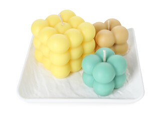 Three colorful bubble candles isolated on white