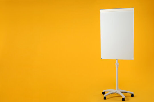 Flip chart on orange background. Mockup for design