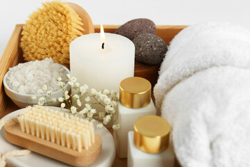 Different spa supplies on light background, closeup
