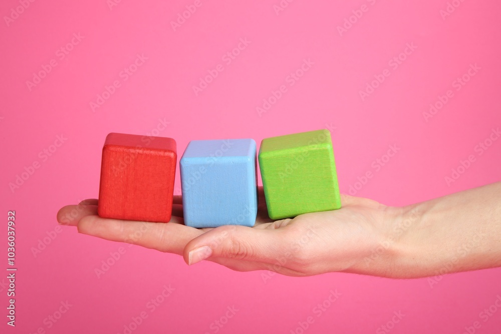 Sticker Woman with colorful cubes on pink background, closeup