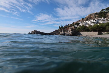 Coast line of La Herradura in Spain taken from the water