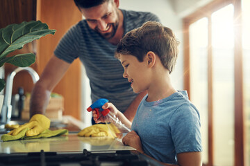Family, housekeeping and cleaning with father, boy and equipment with spray bottle, cloth and...