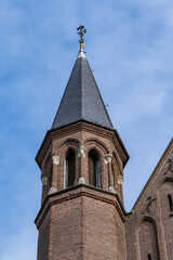 Fototapeta premium Vondel Church (Vondelkerk) had been in use for Catholic worship from 1880. The first stone of this neo-Gothic, cross-shaped basilica was laid in 1872. AMSTERDAM, the NETHERLANDS. 