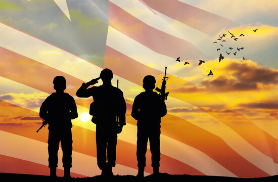 Silhouette of a soldier with a background of the Liberia flag and a sunset or sunrise. Concept of national holidays. Commemoration Day. - Powered by Adobe