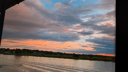 sunset over the river © Marcela