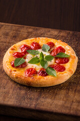 Delicious Mini Margherita Pizza On Rustic Wooden Board