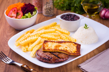Delicious Brazilian Meal with Fries, Rice, and Grilled Protein