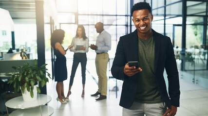 Office, businessman and portrait with smartphone for chat, text message and connection for communication. Workplace, male person and employee with mobile app for notification, salary alert and happy