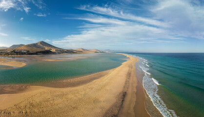 Aerial view Playa de Sotavento, Fuerteventura: a breathtaking view of crystal-clear lagoons and...