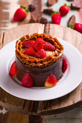 Delicious Chocolate Cake with Strawberries and Caramel Topping