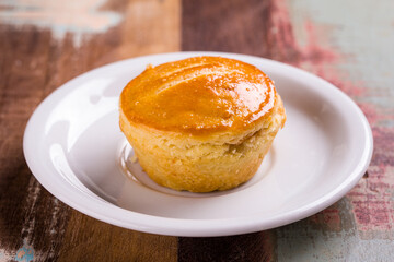 Delicious Homemade Cake on a White Plate in Rustic Setting