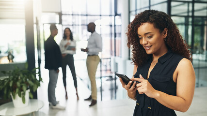 Obraz premium Office, businesswoman and scroll with smartphone for chat, text message and connection for communication. Workplace, female person and employee with mobile app for notification, salary alert or happy