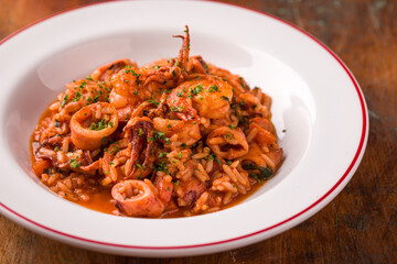 A Delicious Mediterranean Seafood Risotto in a White Bowl