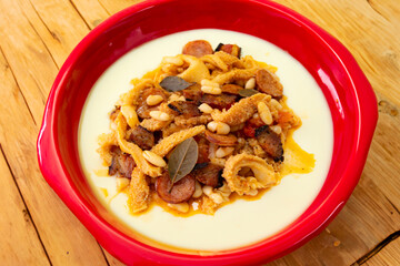 Beef tripe (bucho), beef stomach, tripe on a white plate. Dobradinha
