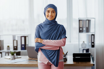 Business Career For Muslim Woman. Portrait Of Confident Arabic Businesswoman In Hijab Standing With...