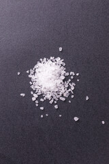 Close-Up Of Coarse Salt Crystals On Dark Background