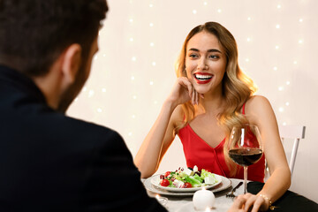 Pleasant Evening. Couple Enjoying Romantic Date In Restaurant, Celebrating Valentine's Day Or Anniversary Together, Selective Focus