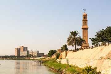 Baghdad, Iraq - 11 November 2022: Al Quishla, clock tower in Baghdad city centre on the shore of the river © Анастасия Смирнова