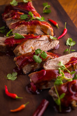 Delicious Sliced Beef Ribs with Spicy Sauce and Fresh Herbs