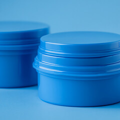 Close up of sleek blue plastic containers with simple backgrounds generated.AI