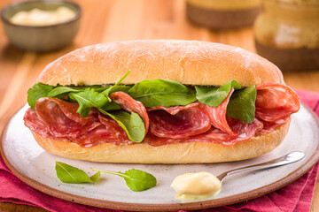 Delicious Italian Salami Sandwich With Fresh Arugula And Mayonnaise