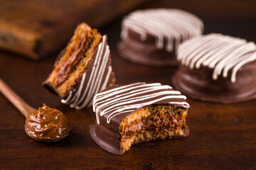 Delicious Chocolate Alfajores with Dulce de Leche Filling and Icing