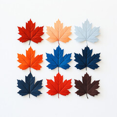 Obraz premium Nine colorful maple leaves arranged in a grid on a white background.