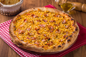 Delicious Corn and Bacon Pizza on Rustic Wooden Table