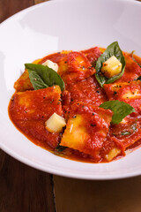 Delicious Ravioli Pasta in Rich Tomato Sauce with Basil