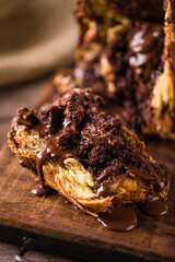 Delicious Chocolate Drizzled Panettone on Rustic Wooden Board