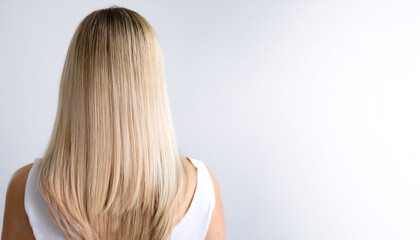 Naklejka premium blonde hair in back side on side position provides copy space for text. background concept isolated white