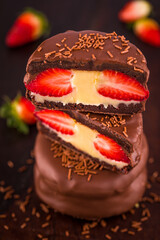 Close-Up of Chocolate Strawberry Dessert with Cream Filling