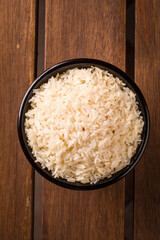 Bowl of Cooked White Rice on Wooden Table