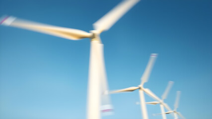Fototapeta premium A conceptual image of wind energy, with blurred motion of turbine blades spinning against a clear sky, symbolizing the generation of clean power. Generative AI
