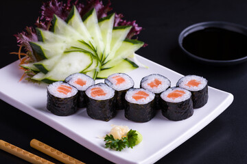 Elegant Sushi Platter With Fresh Salmon Rolls and Garnish Art