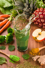 Refreshing Green Juice Splash With Fresh Fruits and Vegetables