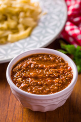Delicious Homemade Bolognese Sauce in a White Ceramic Bowl
