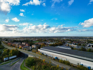 Fototapeta premium High Angle Footage of North Luton City of England UK. Aerial Footage Was Captured with Drone's Camera on October 17th, 2024 at Just Before Sunset Time.