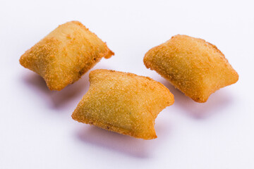 Three Crispy Pastries on a Clean White Background