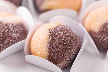 Assorted Dois Amores Sugar-Coated Chocolate Pastries in White Wrappers