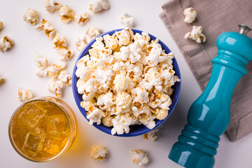 Gourmet Popcorn with Refreshing Beverage and Pepper Grinder